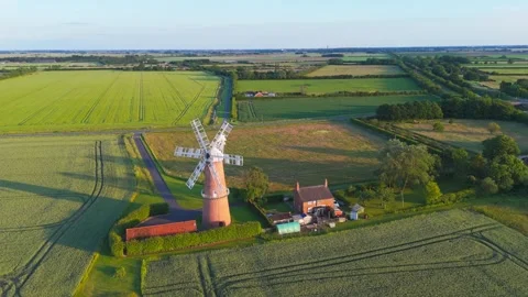 Aerial view captures an old windmill standing tall Vidéo 342614150