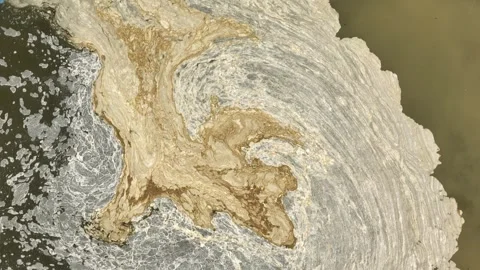 Aerial view captures polluted river water. Vídeo Stock 347721404