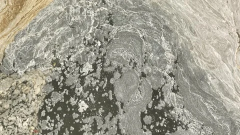 Aerial view captures polluted river water. Vídeo Stock 347721423