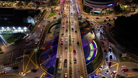 Aerial view captures rhythmic car traffic flow at Bulatan Dato Onn Video stock 262026899