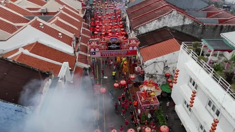 Aerial view captures temple parade at Jonker Street in daytime Stock-Footage 332157246