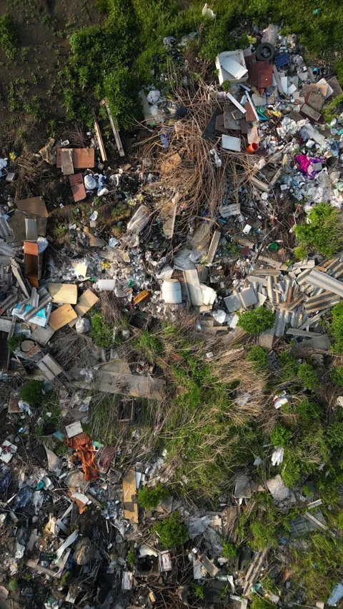 Aerial view capturing expansive landfill site, highlighting widespread waste Stock Footage 319169034