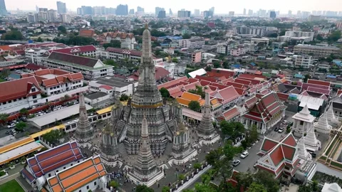 Aerial View Capturing Religious Monuments of Buddhist Stupa Among Modern City Stock-Footage 338360315