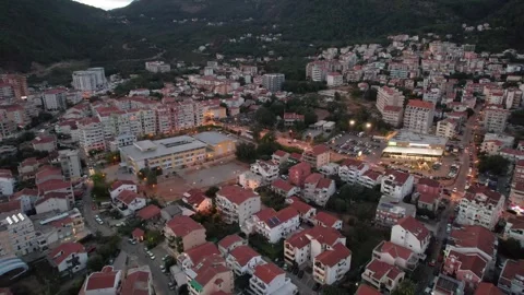 Aerial View Capturing Urban Development at Dusk in a Budva, Montenegro Stock Footage 320745948
