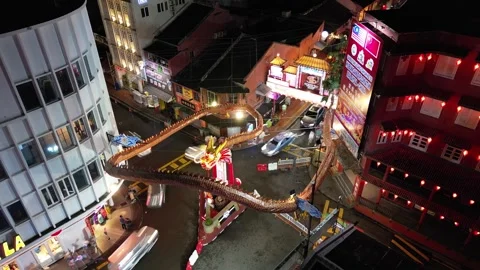 Aerial view capturing vibrant light trails from moving vehicles at night Stock-Footage 318271903
