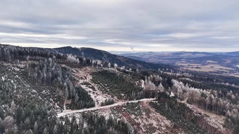 Aerial View Capturing Winter Wilderness With Winding Mountain Road Through Stock Footage 342403415
