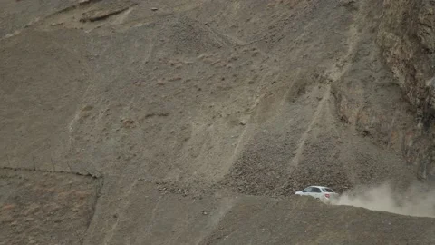 Aerial view of car driving along the mountain chain. car moving on the Stock Footage 200857142