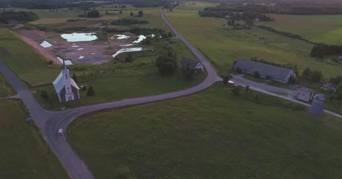 Aerial view. Car Driving on Country Road at dusk with headlights. Stock Footage