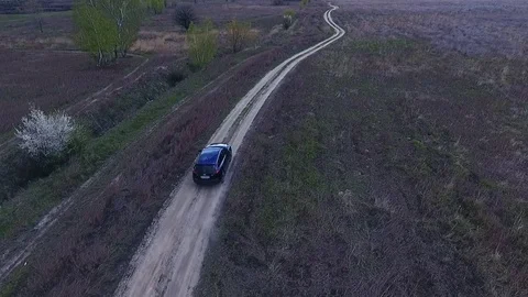 Aerial view of car driving through rural road. Stock Footage 78625963