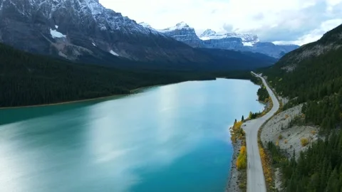 Aerial view of car driving through the forest in national park. Stock Footage 200352160