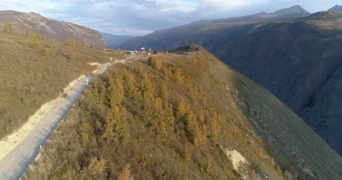 Aerial view of car going to the observation deck of Katu Yaryk mountain pass Stock Footage 143963594