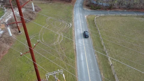 Aerial view of car moving on the road during Winter in Cape Cod, USA Stock Footage 232395948