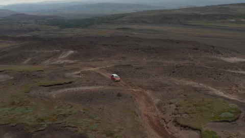 Aerial view car parked in desolate countryside off road in Iceland. Drone view Stock Footage