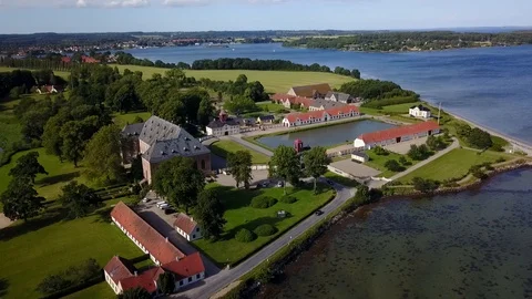Aerial view of car passing through Danish castle gates Stock Footage 87691786