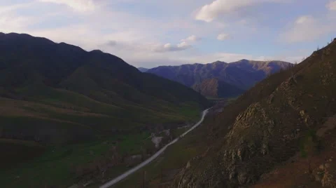 AERIAL VIEW of the car path in the mountains Stock Footage 67561280
