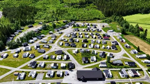 Aerial view of a caravan park in a forest in Norway. Stock Footage 344999306