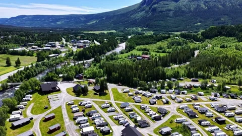 Aerial view of a caravan park in a lush green valley, Norway. Stock Footage 344999260