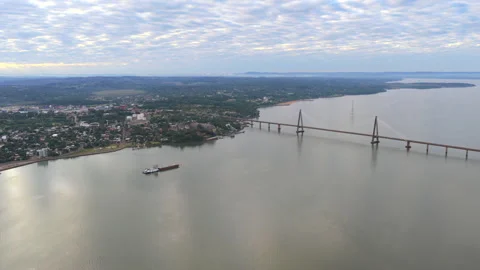 Aerial View of Cargo Barge and International Bridge on the Parana River 스톡 동영상 337434344
