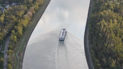 Aerial view of a cargo barge on the canal in Bantzenheim, France. Stock Footage 345062152