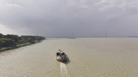 Aerial View of Cargo Boat Approaching on the Wide Padma River in Bangladesh Video stock 342618973