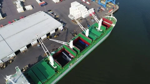 Aerial View of Cargo Container Ship Being Loaded Unloaded Stock Footage 75434598