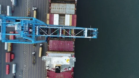 Aerial View of Cargo Container Ship Being Loaded Unloaded Stock Footage 75434617
