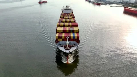 Aerial View of Cargo Container Ship Leaving Port Stock Footage 186411108