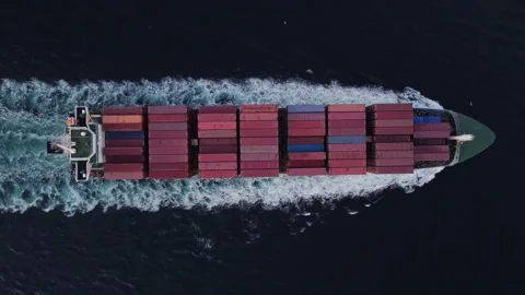 Aerial view of cargo container ship in the sea at night Video stock 221941855