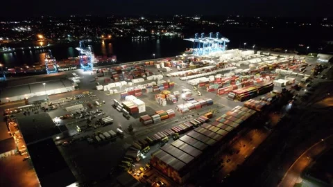 Aerial View of Cargo Container Shipping Port at Night Stock Footage 163324471