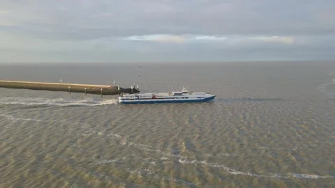 Aerial view of cargo ferry (Ms Noord-Nederland) leaving the harbour, Netherlands Stock Footage 268813699
