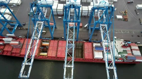 Aerial View of Cargo Ship Being Unloaded Stock Footage 154080486