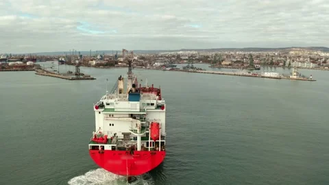 Aerial view of cargo ship calling at the port . Stock Footage 154466158