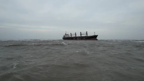 Aerial view of cargo ship crossing rough open water in China Stock Footage 337888111