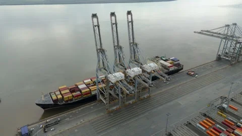 Aerial view of cargo ship at dock, United Kingdom. Stock Footage 319831480