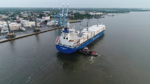 Aerial View of Cargo Ship Entering Port of Philadelphia and Parking Stock Footage 78331021