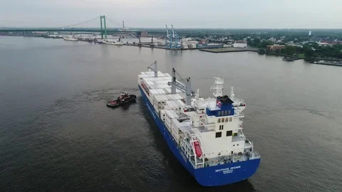 Aerial View of Cargo Ship Entering Port of Philadelphia and Parking Stock Footage 78331196