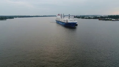 Aerial View of Cargo Ship Entering Port of Philadelphia and Parking Stock Footage 78331243