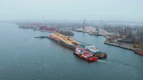 Aerial view of Cargo ship. Large container ship on the river - Aerial top down. Video stock 159492721