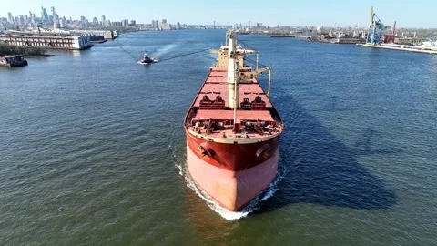 Aerial View of Cargo Ship Leaving Port Stock Footage 240694920