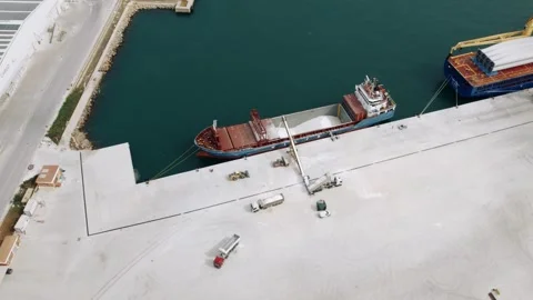 Aerial View of Cargo Ship Loading Bulk Goods at Port Dock Stock Footage 344530808