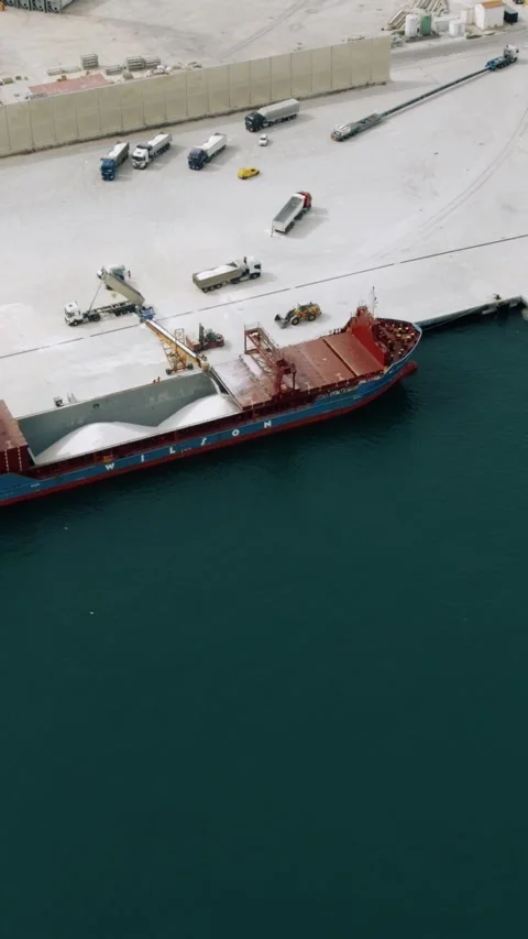 Aerial view of cargo ship loading bulk material  Castellon, Spain 28.07.2026 Stock Footage 345828170