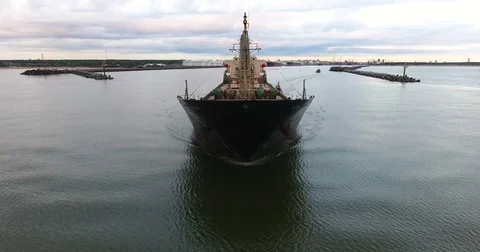 Aerial view of cargo ship in motion in front of the ship at low altitude - 15 動画素材 79738493