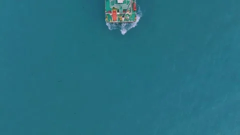Aerial View of Cargo Ship Navigating Turquoise Waters, South Africa Stock Footage 333137567