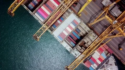 Aerial view cargo ship or oil tanker docking in sea port warehouse container Stock Footage 336446334