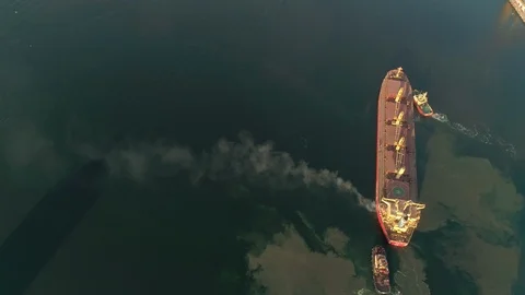 Aerial view on Cargo Ship Polluting Air With Smoke Stock Footage 108012418