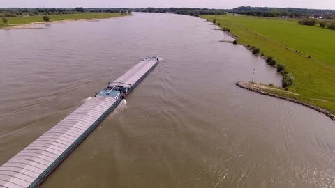 Aerial View of a Cargo Ship on River Rhine transporting Goods, Germany Stock Footage 89706460