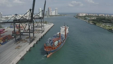 Aerial view Cargo ship sailing from loading dock Stock Footage 120467685