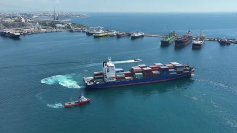 Aerial view of cargo ship sailing - Piraeus,Greece- March 2023 Stock Footage 262372053