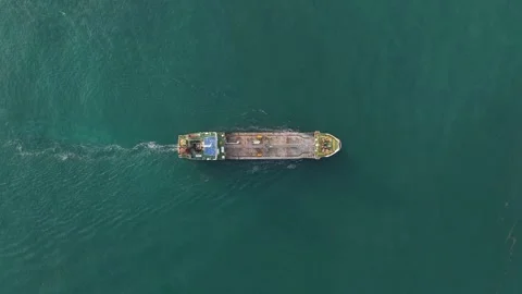Aerial view of a cargo ship sailing in the open sea Stock Footage 329556939