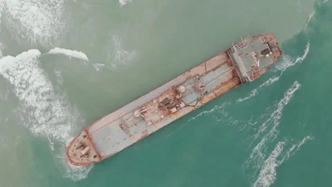 Aerial view of a cargo ship stranded off the coast of the city of Al-Jubail Stock Footage 111136642